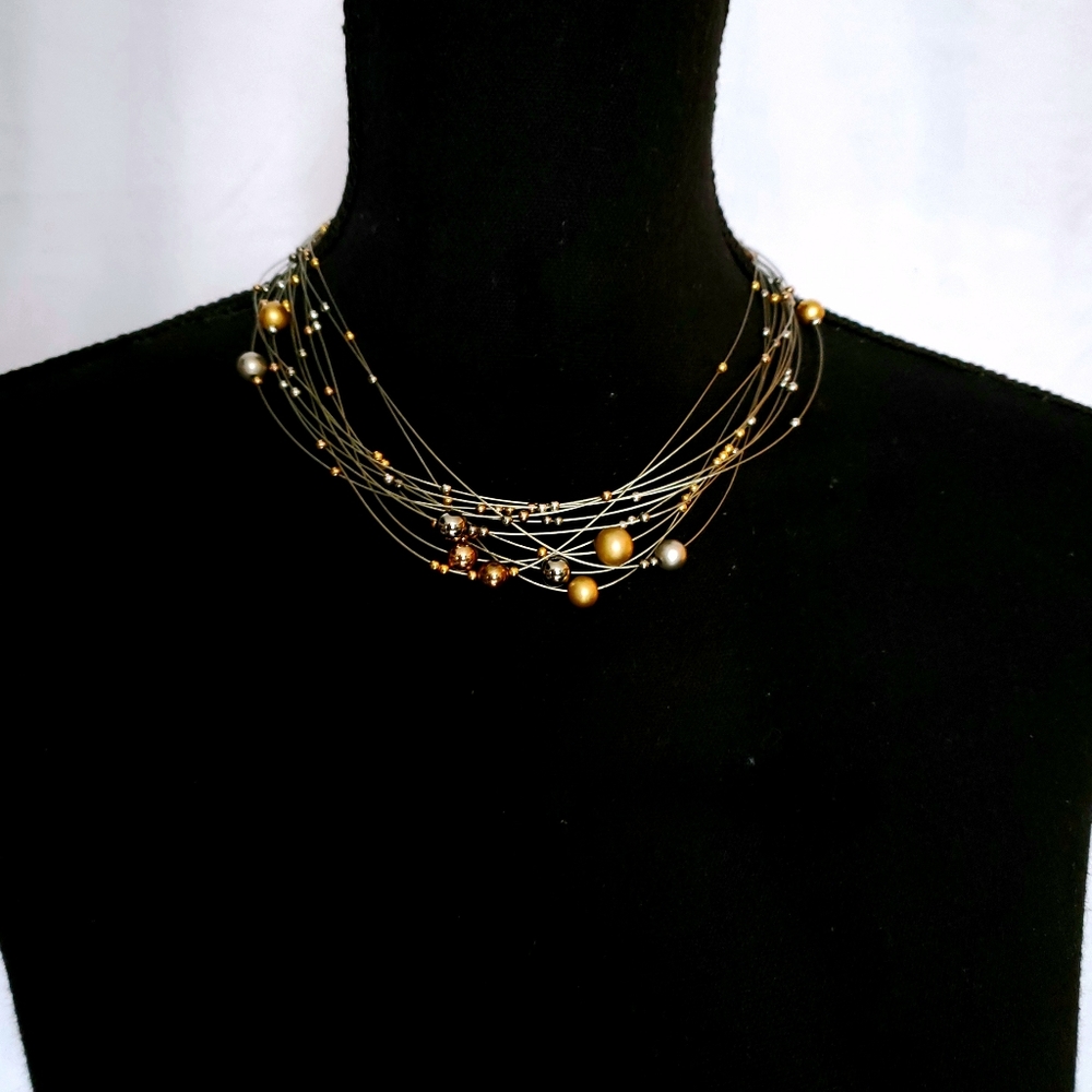 Orbit choker In gold and silver